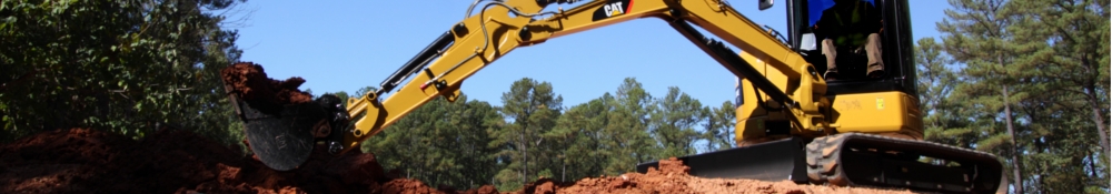 CATERPILLAR GUMIHEVEDERES MINIKOTRÓK
